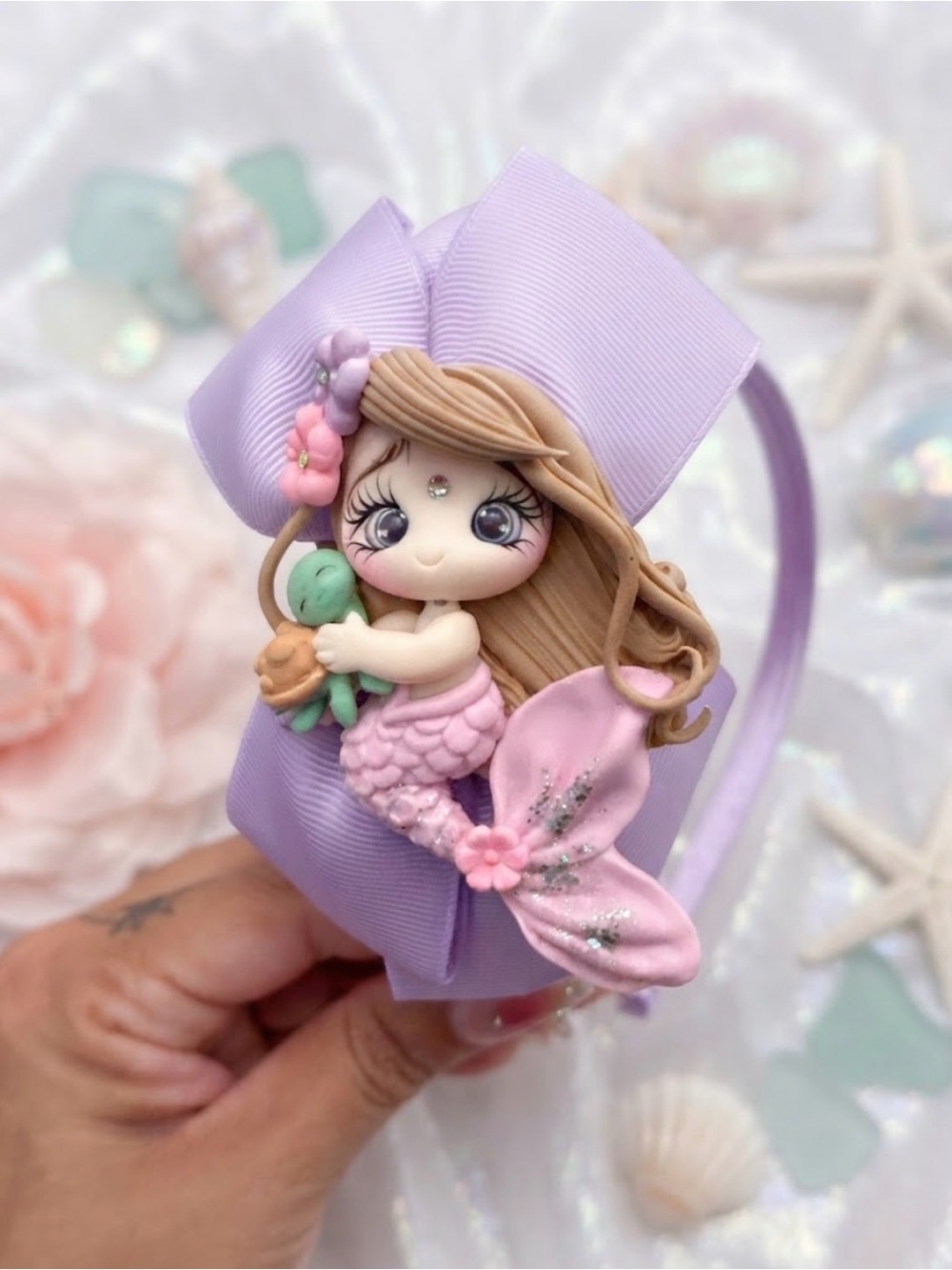 Custom clay bow 
Handmade Lavender Mermaid Headband for Kids